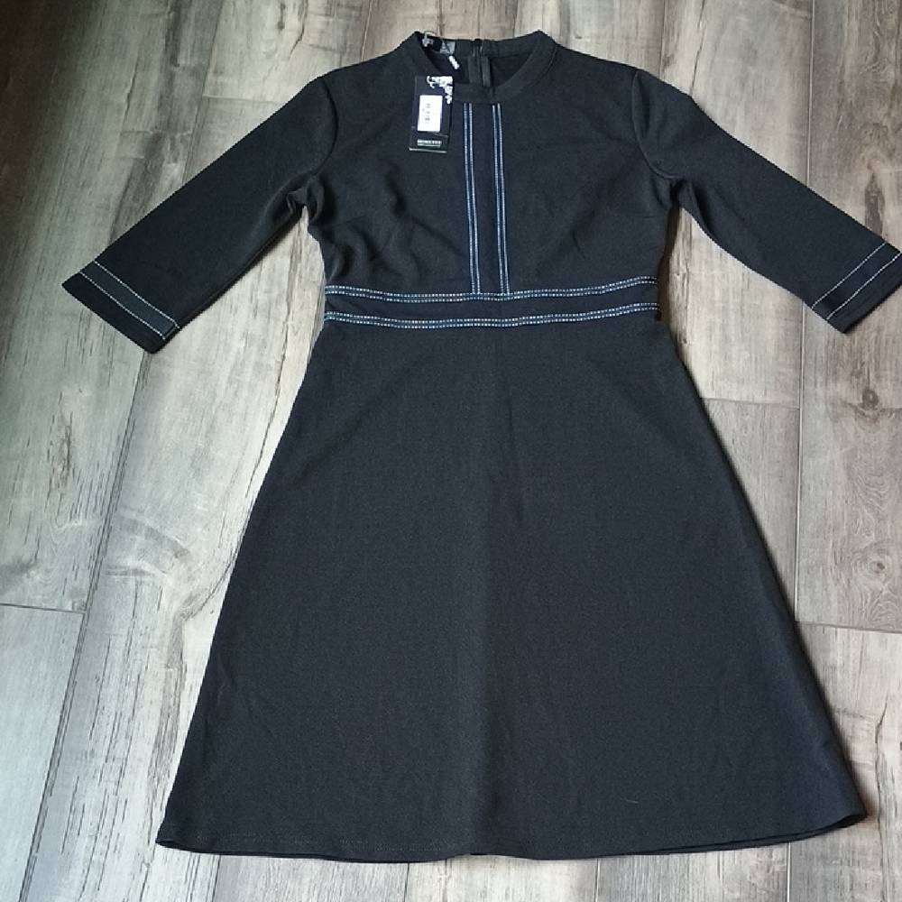 Elegant Black Dress with White Stitching